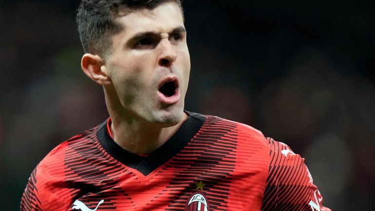 AC Milan's Christian Pulisic celebrates after scoring his side's second...