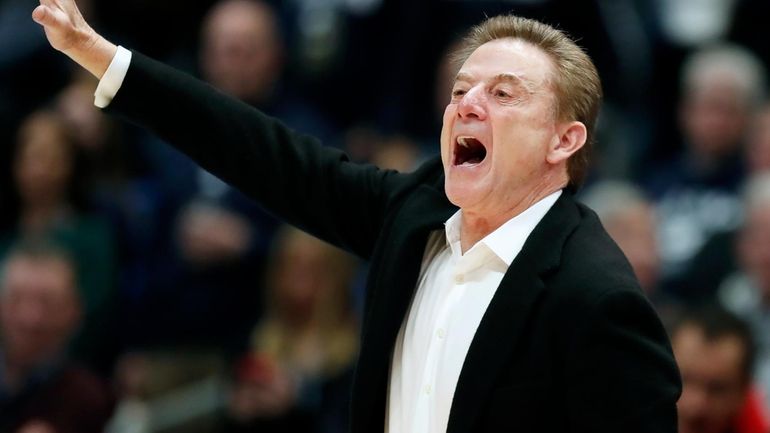 St. John's coach Rick Pitino reacts during the second half...