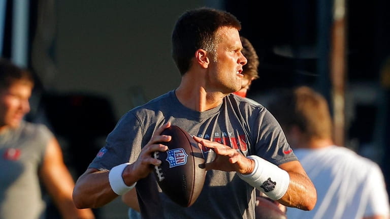Tom Brady of the Tampa Bay Buccaneers works out during...