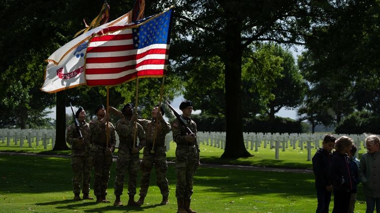 Flag bearers of the the 101st Airborne Division, known as...