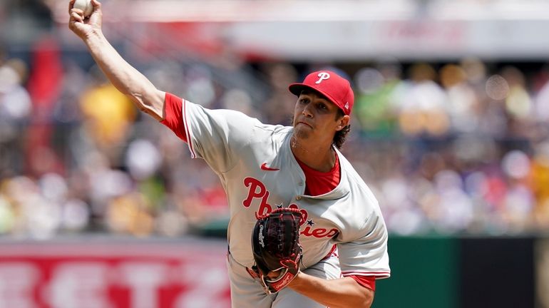 Philadelphia Phillies starting pitcher Tyler Phillips delivers during the first...