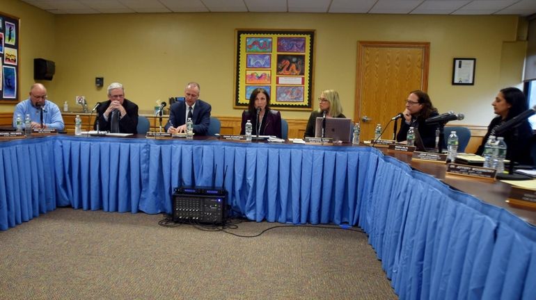 Members of the Half Hollow Hills school board at Wednesday's...