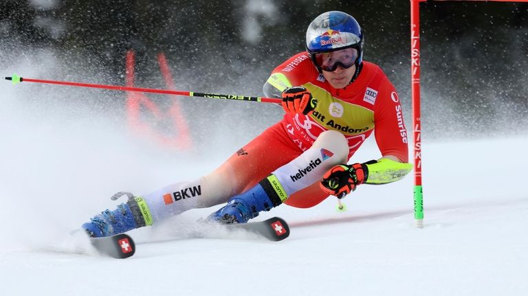 Switzerland's Marco Odermatt speeds down the course during a men's...