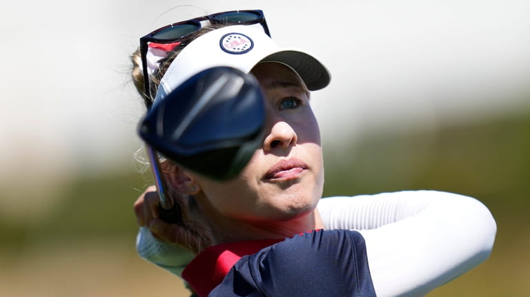 United States' Nelly Korda plays her tee shot on the...