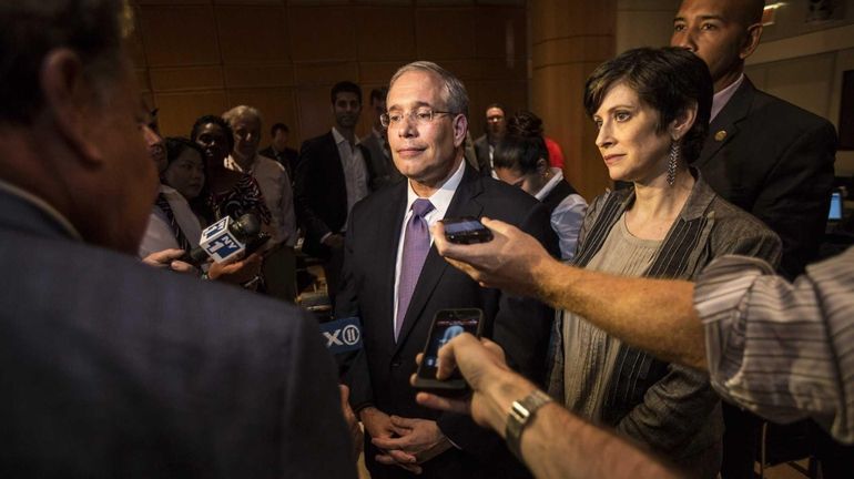 Scott Stringer speaks to the media after a debate against...