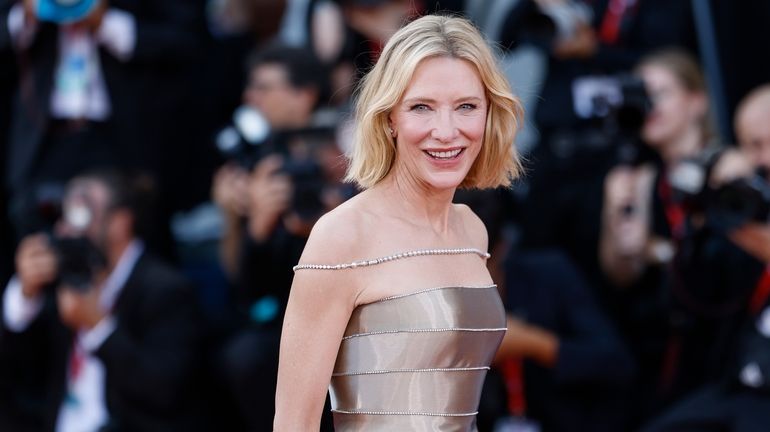 Cate Blanchett poses for photographers upon arrival for the premiere...