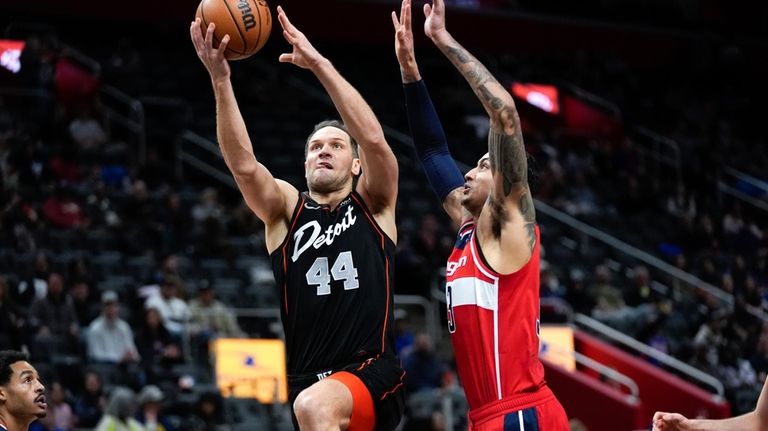 Detroit Pistons forward Bojan Bogdanovic (44) drives on Washington Wizards...