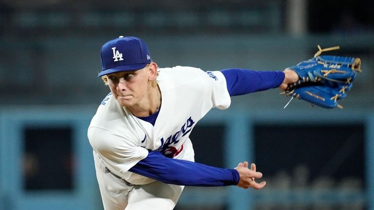 Los Angeles Dodgers starting pitcher Emmet Sheehan throws to the...