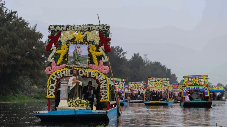 A relic of St. Jude Thaddeus is transported in a...