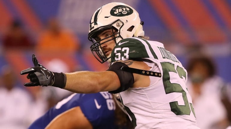 Jets linebacker Dylan Donahue lines up against the Giants at...
