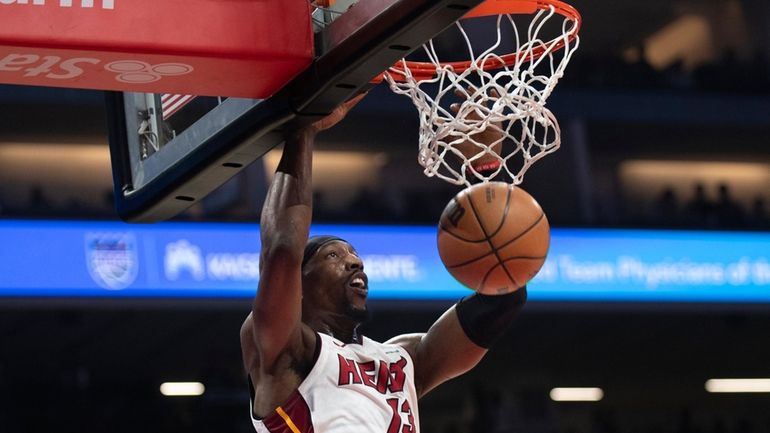 Miami Heat center Bam Adebayo scores in the first quarter...