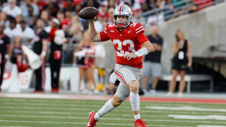 Ohio State quarterback Devin Brown throws a pass against Western...