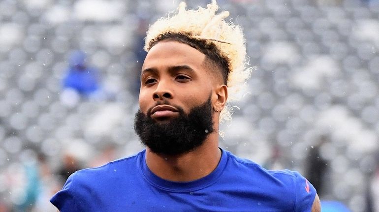 Giants wide receiver Odell Beckham Jr. leaves the field after...