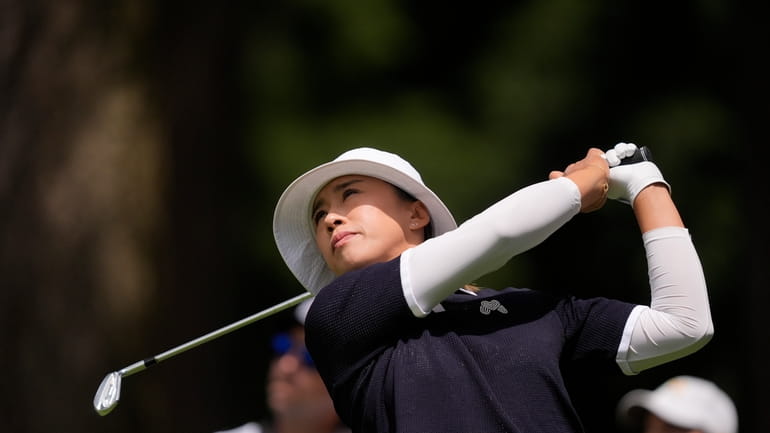 Amy Yang, of South Korea, hits from the fifth tee...