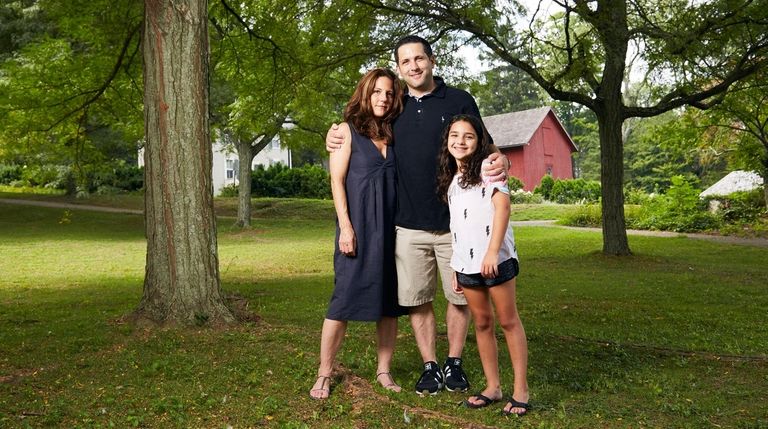 ESPN correspondent Adam Schefter, with wife Sharri and daughter, Dylan....