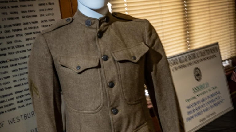 This uniform was worn by Cpl. George Anthony Hesse, Jr...