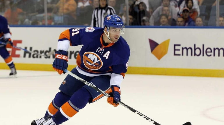 John Tavares #91 of the New York Islanders skates against...