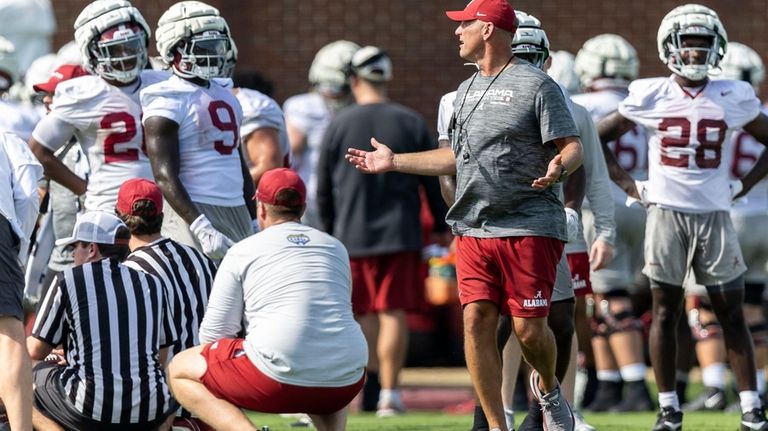 Alabama head coach Kalen DeBoer directs his players during NCAA...