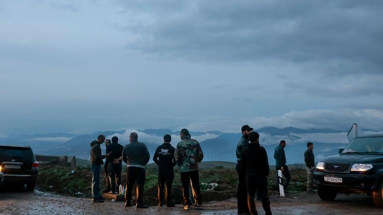 Ethnic Armenians from Nagorno-Karabakh look at the Nagorno-Karabakh landscape on...