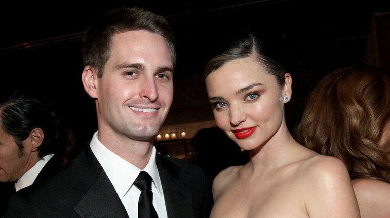 Evan Spiegel and Miranda Kerr pictured on Nov. 12, 2016,...