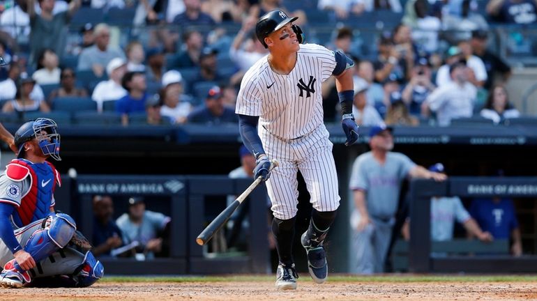 New York Yankees batter Aaron Judge hits a home run...