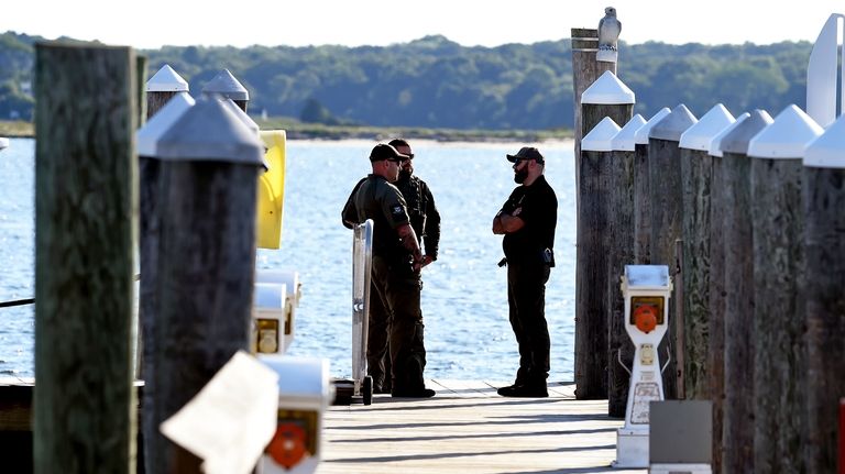 Police on the scene at Harbor One Marina in Old...