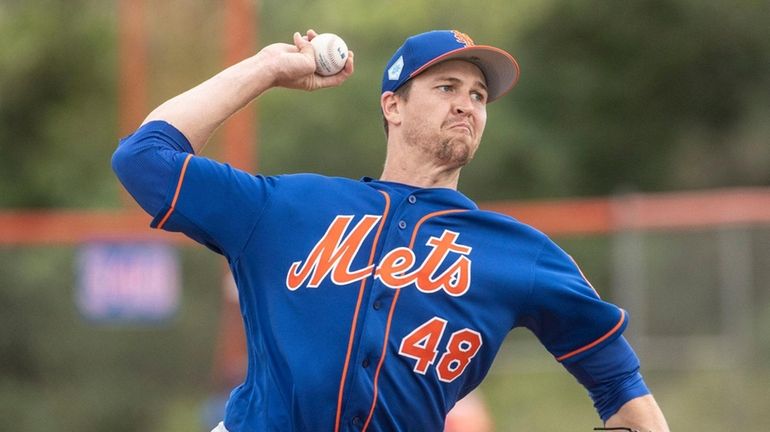 Last year's NL Cy Young Award winner Jacob deGrom, shown...