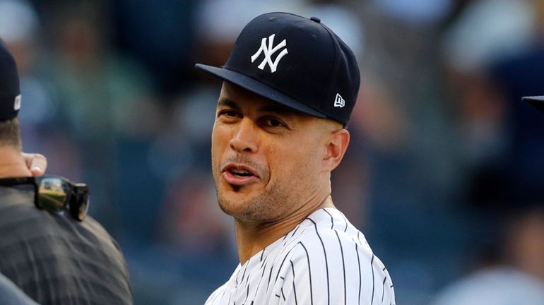 Giancarlo Stanton of the Yankees looks on after a game against the...