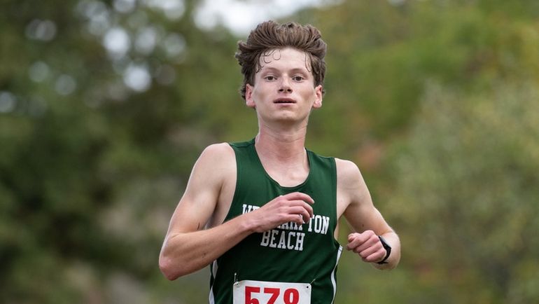 Max Haynia of Westhampton crosses the finish line in first...