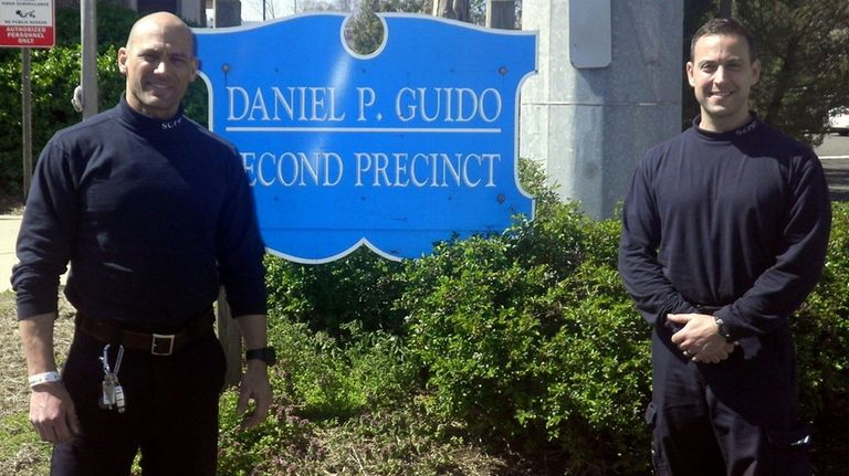 Second Precinct officers Shane Wild, left, and Steven Capogna used...