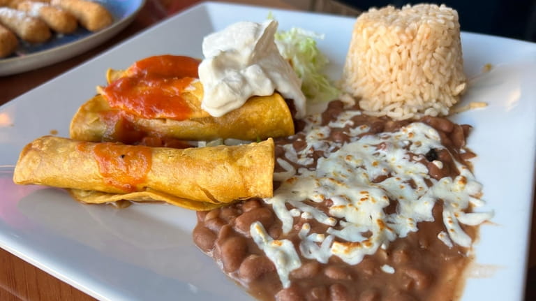 Chicken flautas with rice and beans at the new Viva...