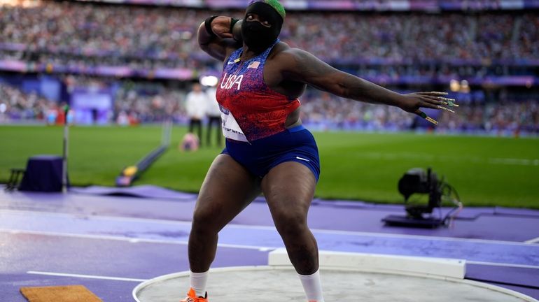 Raven Saunders, of the United States, competes in the women's...