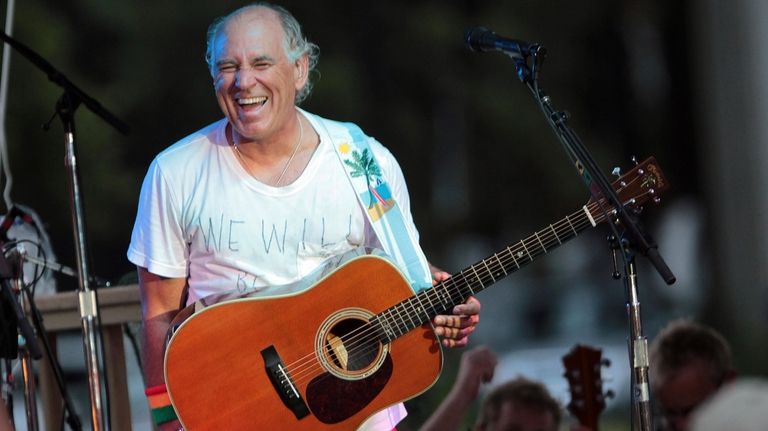 Jimmy Buffett performs at his sister's restaurant in Gulf Shores,...