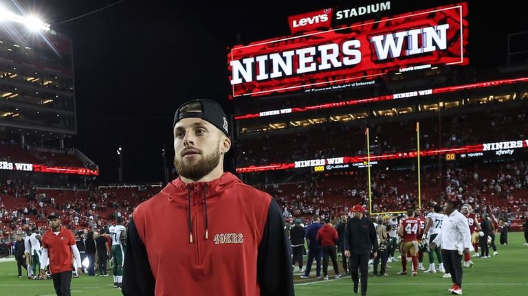 San Francisco 49ers wide receiver Ricky Pearsall walks off the...