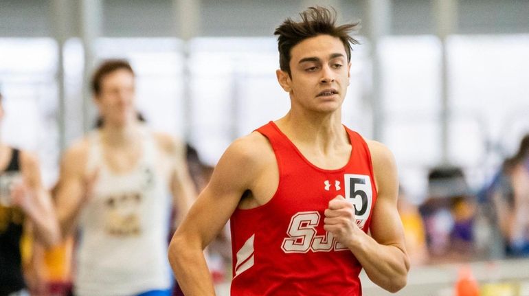 Fernando Sanchez of St. John the Baptist wins the boys 600-meter...