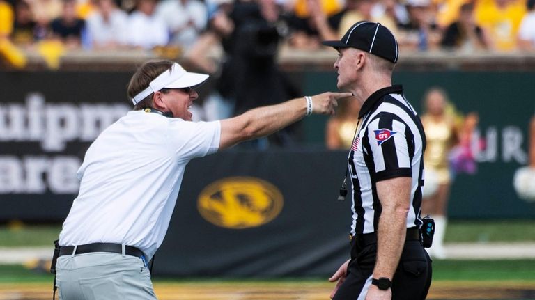 Missouri head coach Eliah Drinkwitz argues a penalty during the...