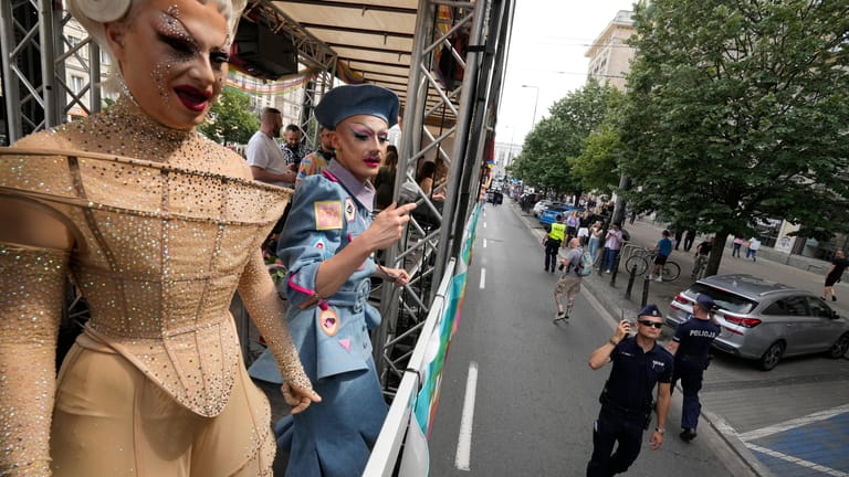 People take part in the Equality Parade, an LGBT pride...