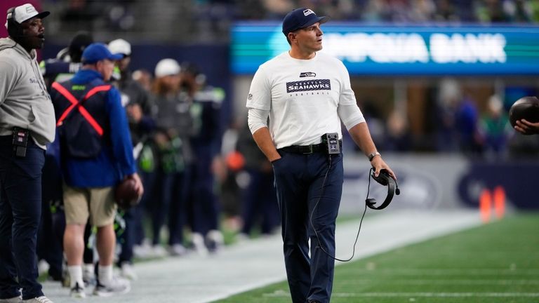 Seattle Seahawks head coach Mike Macdonald looks on during the...