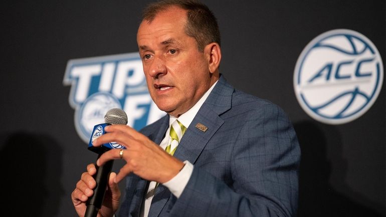 Atlantic Coast Conference Commissioner Jim Phillips speaks during NCAA college...