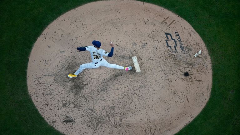 Milwaukee Brewers' Devin Williams pitches during the ninth inning of...