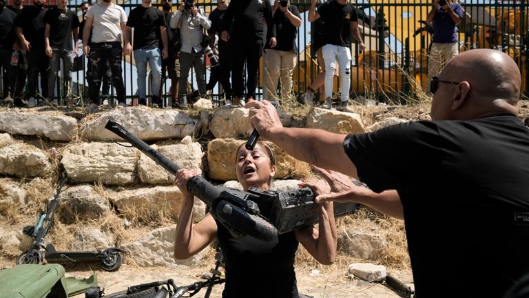 A woman from the Druze minority is overcome by emotion...