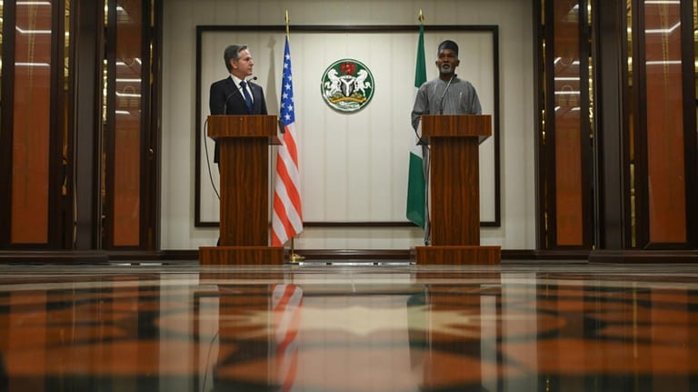 US Secretary of State Antony Blinken, left, attends a press...