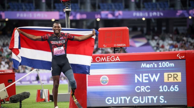 Sherman Isidro Guity Guity of Costa Rica celebrates after winning...