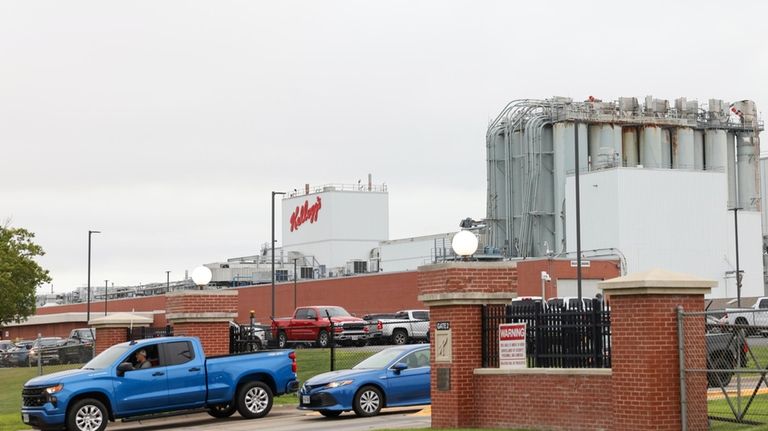 Employees leave the Kellogg's Omaha manufacturing plant, on Tuesday, Aug....