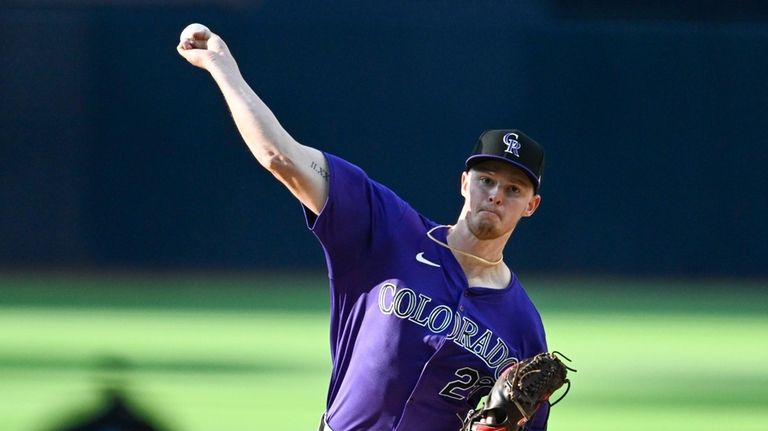 Colorado Rockies starting pitcher Tanner Gordon delivers during the first...