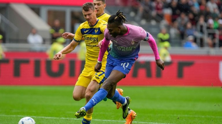 AC Milan's Rafael Leao scores his side's opening goal during...