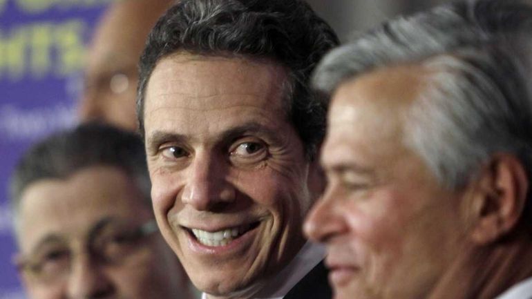 Gov. Andrew Cuomo, center, with from left, Assembly Speaker Sheldon...