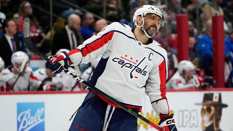 Washington Capitals left wing Alex Ovechkin waits for play to...