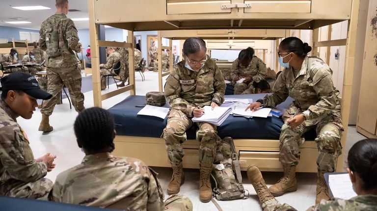 Students enlisted in the new Army prep course work together...