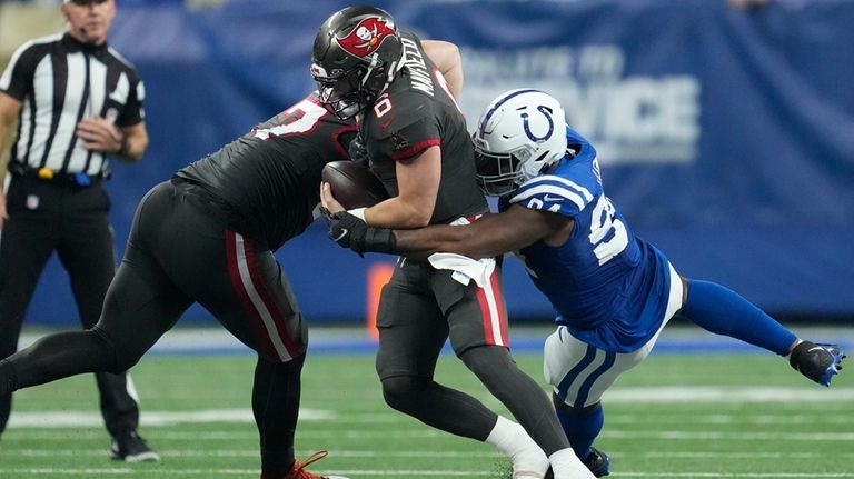 Indianapolis Colts defensive end Tyquan Lewis (94) sacks Tampa Bay...